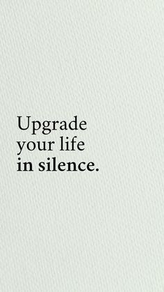 the words upgrade your life in silence are written on a white paper with black lettering