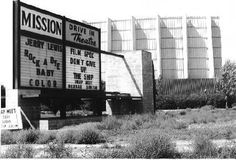 a black and white photo of the mission drive in theatre