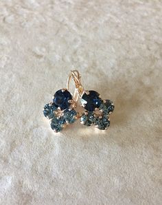 Gorgeous pair of crystal cluster earrings featuring crystals in rich navy blue and steel blue. 1 inch long. Lever back closure for pierced ears. Thanks for stopping by. Blue Drop Earrings With Lever Back, Navy Earrings, Crystal Cluster Earrings, Swarovski Crystal Drop Earrings, Cream Earrings, Gray Jewelry, Jewellery Sketches, Swarovski Crystal Bracelet, Earrings Bridesmaid