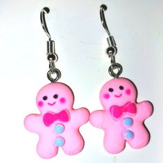 pair of pink ginger earrings with bow tie