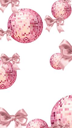 pink disco balls with bows and ribbons flying through the air