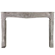 an old white fireplace mantel with carvings on the front and sides, isolated against a white background