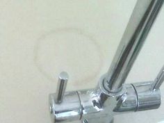 a close up of a faucet on the wall