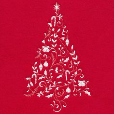 a white christmas tree on a red background