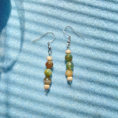 Earrings with green and wooden beads Wooden Beads, Beaded Earrings, Jewelry Crafts, Jewelry Earrings Dangle, Etsy Earrings, Dangle Drop Earrings, Dangle Earrings, Handmade Items, Jewelry Earrings