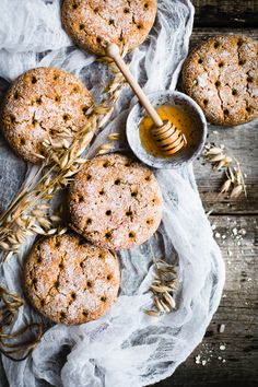 cookies with honey and sprinkles on a table