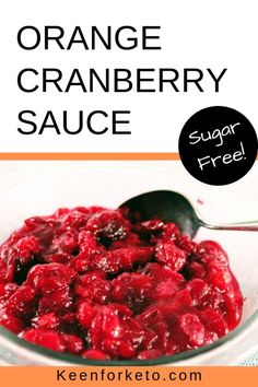 an orange cranberry sauce in a bowl with a spoon next to it and the title overlay reads, orange cranberry sauce