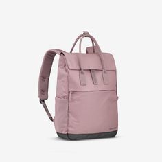 a pink backpack on a white background