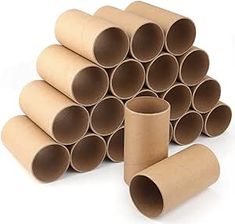 several cardboard tubes stacked on top of each other