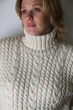 Behold this resplendent beige sweater, a veritable masterpiece of handcrafted artistry. Fashioned with meticulous precision, this cable and Aran sweater emanates opulence from its exquisite high-quality blend yarn. A harmonious fusion of superwash wool and acrylic is deftly interwoven to bestow upon this garment the twin virtues of durability and resilience. It stands as an unwavering testament to its immunity against the perils of felting and shrinking. This creation is not merely warm; it is a Mens Knitted Scarf, Womens White Sweater, Winter Knit Sweater, Aran Sweater, Ladies Turtleneck Sweaters, Hand Knitted Sweaters, Winter Sweater, Christmas Gift Idea, Pullover Sweater Women