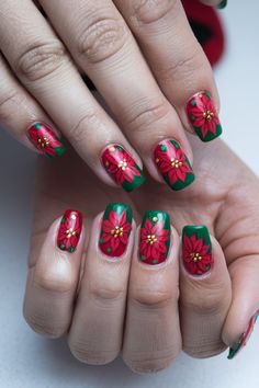 Add a touch of elegance to your holiday nails with poinsettia-inspired designs. Perfect for Christmas celebrations! #christmasnailsacrylic Ponsetia Nails, Christmas Poinsettia Nails