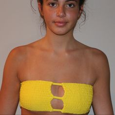 This Beautiful Bikini Radiates A Gorgeous Yellow Hue And Stuns At The Beach Trendy Strapless Tube Top For Vacation, Stretch Smocked Bandeau Tube Top, Stretch Tube Top For Beach Party, Casual Ruched Tube Top For Beach, Casual Ruched Tube Top For The Beach, Beach Bandeau Tube Top With Smocked Bodice, Beach Tube Top With Smocked Bodice, Stretch Beachwear Tube Top For Sunbathing, Trendy Strapless Tube Top For Poolside