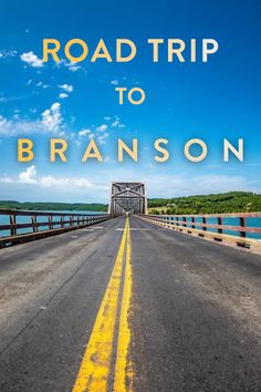 the road trip to branson is shown with yellow lines on it and blue skies in the background