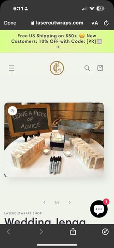 a table topped with lots of different types of items on top of white cloths