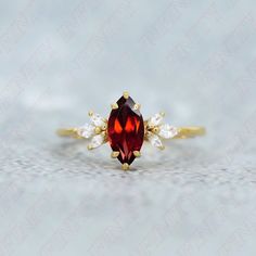 Ring Specifications & Details: Engagement/Wedding/Bridal Ring Stone Size: 10.00 X 5.00 mm Accents: Moissanite Stone Type: AAA Grade Red Garnet Gemstone Stone: Marquise Cut Natural Red Garnet Gemstone Metal Used: 925 Sterling Silver Plating Available: Rhodium/ Yellow/ Rose Gold We apply 2.5 micron of thicker plating on our rings. Stone CTW: 1.25 ctw   You may also favorite our studio for continuous updates on new designs and special discount coupons. Their would be special sale in the beginning o Marquise Ruby Promise Ring With Prong Setting, Marquise Multi-stone Diamond Wedding Ring, Red Marquise Diamond Ring Fine Jewelry, Red Marquise Ruby Ring With Prong Setting, Cluster Gemstone Diamond Ring For Wedding, Red Marquise Diamond Ring With Center Stone, Wedding Cluster Diamond Ring With Gemstone, Elegant Red Marquise Ruby Ring, Marquise Birthstone Ring In Fine Jewelry Style