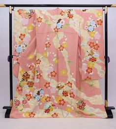 A classic pink vintage silk Furisode Kimono with floral design. Brighten up you day wearing this kimono or by hanging it as a display to enjoy everyday. Item: Furisode Silk Kimono No. frn186 Size: US  L  /  Length 65 inch (166cm), Width 28 inch (72cm). Design :  Floral Condition: Used, Very Good. Please check the photos. Need a Obi Sash? Find it here: https://www.etsy.com/shop/KimonoFujiyamarock?ref=seller-platform-mcnav§ion_id=13757607 Shop the entire collection https://fujiyamarock.etsy.com Sh Pink Kimono For Spring Wedding, Spring Wedding Pink Kimono, Traditional Pink Kimono For Spring, Pink Silk Kimono For Wedding, Pink Silk Wedding Kimono, Pink Kimono With Kimono Sleeves For Tea Ceremony, Pink Kimono For Tea Ceremony, Vintage Floral Print Kimono For Wedding, Traditional Pink Silk Kimono