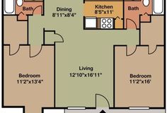 the floor plan for a two bedroom apartment with an attached kitchen, living room and dining area