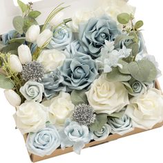 a box filled with blue and white flowers