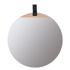 a round mirror with a black clip on it