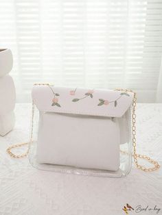 BirdinBag - Clear Square Bag with Flower Embroidery and Twist Lock Flap White Flower Shaped Shoulder Bag With Large Capacity, White Large Capacity Flower-shaped Shoulder Bag, White Flower-shaped Large Capacity Shoulder Bag, Spring Rectangular Shoulder Bag With Floral Embroidery, Spring Floral Embroidered Shoulder Bag, Spring Floral Embroidery Shoulder Bag, Spring Rectangular Bag With Floral Embroidery, Rectangular Bags With Floral Embroidery For Spring, Rectangular Bag With Floral Embroidery For Daily Use