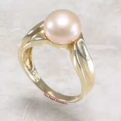 Pearls provide a sophistication that never goes out of style, an elegant masterpiece for all occasions; featuring a 14k solid yellow gold ring band subtle wave pattern that adds a touch of elegance. The pearl itself size has approximately 9-10mm in diameter Now available in ring sizes 6, 7 or 8  1.    Main Stone: Freshwater Cultured Pearl 2.    Grade:  premium quality 3.    Pearl size:  approximately 9mm in diameter 4.    Color:  Pink 5.    Ring Total Weight:  approximately 3.8 Grams 6.    Metal Timeless Pink Ring Jewelry, Classic Pink Ring With Polished Finish, Elegant Pink Pearl Round Ring, Pink Pearl Ring For Wedding, Classic Pink Round Jewelry, Pink Pearl Ring, Gold Ring Band, Ring Sizes, Wave Pattern