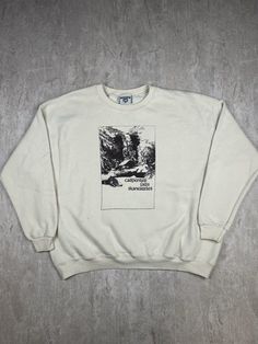 This Vintage Skaneateles New York Lee Carpenter Falls Sweatshirt, in men's size 2XL, features a classic crewneck design with a scenic graphic of Carpenter Falls. Its cozy fabric and nostalgic print make it a perfect piece for showcasing local pride and enjoying casual comfort. Please refer to the provided pictures for a detailed view of the condition and measurements of this item. We strive to present our pieces as accurately as possible, ensuring you have a clear understanding of their fit and Outdoor Logo Print Crew Neck Sweatshirt, Outdoor Crew Neck Sweatshirt With Logo Print, Outdoor Graphic Print Crew Neck Sweatshirt, Graphic Print Crew Neck Sweatshirt For Outdoor, Outdoor Pre-shrunk Crew Neck Sweatshirt, Local Pride, Crewneck Design, Mens Hoodies, Cozy Fabric