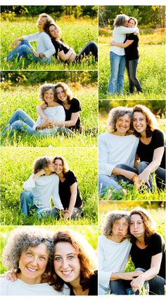 two women hugging each other while sitting in the middle of a grassy field with trees behind them