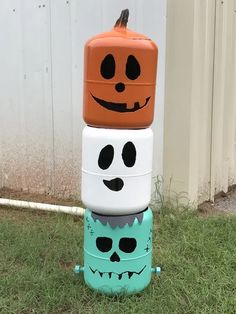 three halloween containers stacked on top of each other