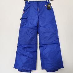 Snow Pants Blue Winter Bottoms With Pockets, Winter Blue Bottoms With Pockets, Casual Blue Bottoms For Outdoor Activities, Winter Sports Pants With Pockets, Outdoor Blue Pants With Pockets, Blue Full-length Winter Pants, Casual Blue Winter Pants, Blue Wide Leg Winter Pants, Blue Wide Leg Pants For Winter