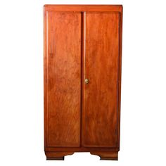 an antique wooden armoire with two doors