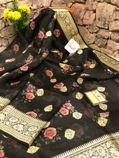 With detailed digital print work done with intricate detail makes this designer collection one of the sorted and unique buys to try for any light occasion or party in a great onyx black color. It is beautifully paired with woven zari work on the border and the pallu and mandala butta work on the body makes this saree unique. Color: A shade of onyx black color Technique: Amazing work of traditional zari weaving on the whole saree with digital floral print work on the body Fabric: Organza Quality: Organza Banarasi Saree, Work Online, Color Techniques, Kinds Of Fabric, Contrast Blouse, Latest Sarees, Zari Work, Designer Blouse, Banarasi Saree