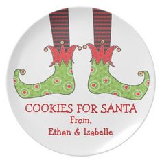 cookies for santa plate with two green christmas boots on the front and red striped stockings on the back