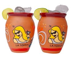 two orange vases with drinks and lemon wedges on them, one has a woman's face painted on the side