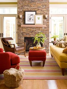 a living room filled with furniture and a fire place