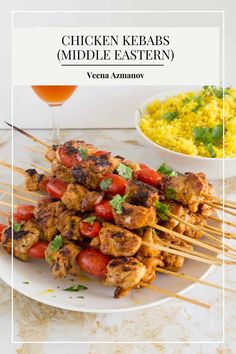 chicken kebabs and rice on a white plate with the words chicken kebabs middle eastern