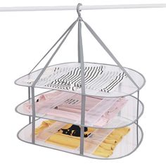 three tiered hanging organizer with folded shirts