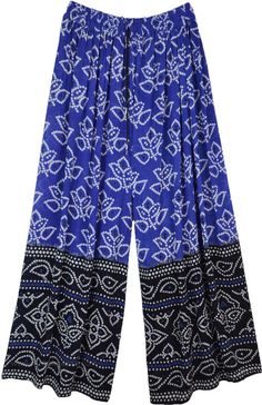 A cool pair of palazzo pants in blue and black with a white tie-dye look block print, these wide leg pants are lightweight, slightly sheer and very comfortable for lounging.  These airy pants can be worn with a simple top for a relaxed summer look or you can pair it with a fancy blouse for a party style. #tlb #SplitSkirtsPants #Printed #Indian #WideLegPants #BeachPants #HippiePants #coolsummerpants Casual Batik Print Bottoms For Summer, Blue Ankle-length Pants For Spring, Blue Ankle-length Spring Pants, Blue Harem Pants For Spring Vacation, Blue Ankle-length Bottoms With Elastic Waistband, Blue Bohemian Wide Leg Pants For Vacation, Blue Wide-leg Harem Pants For Summer, Blue Harem Pants For Summer, Blue Bohemian Wide-leg Pants