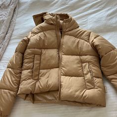 Size Us 2 Never Worn Puffer Jacket With Hood Beige Puffer Outerwear For Outdoor, Brown Puffer Outerwear For Cold Weather, Brown Puffer Outerwear For Spring, Tan Puffer Jacket, Puffer Jacket With Hood, Jacket With Hood, Light Tan, Puffer Jacket, Hooded Jacket