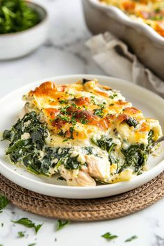 a close up of a plate of food with broccoli and cheese on it