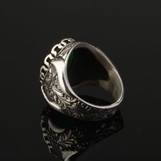 Oval Emerald Silver Men Ring. Handmade in 925 sterling silver with Emerald stone. On the ring Oval Emerald stone settled. Ring body engraved by hand with steel pen and saw technique. Dimensions of stone is 20 mm x 15 mm. Average weight of Oval Emerald Silver Men Ring is 24 gr. (depends your ring size). Back side is open to touch your skin. Classic and exclusive style. Stone Type: Emerald Stone Color: Green Stone Dimensions: 20 mm x 15 mm Stone Shape: Oval Average Weight: 24 gr. Made in Istanbul, Formal Silver Carved Signet Ring, Classic Sterling Silver Carved Engraved Ring, Carved Sterling Silver Signet Ring For Formal Occasions, Classic Carved Sterling Silver Signet Ring, Antique Sterling Silver Engraved Ring With Polished Finish, Engraved Sterling Silver Round Emerald Ring, Classic Carved Silver Signet Ring, Engraved Round Emerald Ring In Sterling Silver, Engraved Sterling Silver Emerald Ring