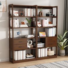 a bookshelf filled with lots of books in a living room next to a window