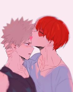 two people with red hair are kissing each other