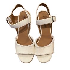 Visit The Lucky Brand Store 4.5 3,606 Lucky Brand Women's Mindra Espadrille Wedge Sandal, 7.5, Ivory, Never Worn Cream Closed Toe Wedge Sandals With Cushioned Footbed, White Block Heel Wedge Sandals For Beach, Cream Wedge Sandals With Heel Strap And Block Heel, Cream Wedge Sandals With Block Heel And Heel Strap, Cream Wedge Sandals With Heel Strap And Round Toe, Cream Block Heel Wedge Sandals With Heel Strap, White Wedge Sandals With Heel Strap And Round Toe, White Platform Espadrilles With Synthetic Material, White Platform Espadrilles In Synthetic Material