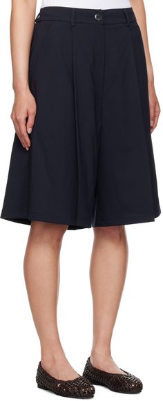 Stretch recycled polyester- and wool-blend delaine shorts. · Belt loops at partially elasticized waistband · Four-pocket styling · Zip-fly · Pleats at front · Logo flag at back pocket Supplier color: Night Bermuda Work Shorts With Elastic Waistband, Knee-length Shorts With Elastic Waistband For Work, High-waisted Bermuda Shorts With Elastic Waistband For Work, Knee-length Workwear Shorts With Elastic Waistband, Navy Short-length Pants With Pockets, Functional Nylon Shorts With 4-way Stretch, Black Knee-length Shorts With Elastic Waistband, Navy Moisture-wicking Shorts, Back Pocket