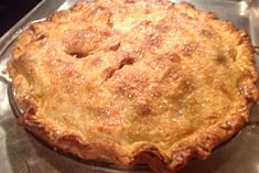 a pie sitting on top of a metal pan