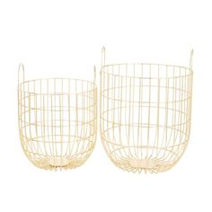 two white wire baskets sitting next to each other