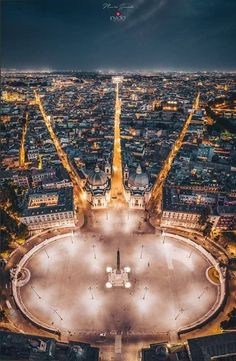 an aerial view of the eiffel tower in paris, france at night time