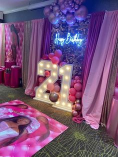 a decorated room with balloons and decorations for a woman's 21st birthday or other special occasion