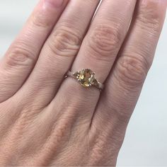 Nwt. Nice Silver Citrine Ring In A Size 6.5. Silver Citrine Ring. Yellow Oval Promise Ring, Yellow Citrine Oval Rings, Yellow Rings With Accent Stones For Promise, Elegant Adjustable Yellow Ring, Elegant Yellow Adjustable Ring, Yellow Citrine Rings With Accent Stones, Citrine Ring, Ring Color, Stone Design