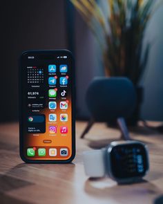 an apple watch sitting on top of a wooden table